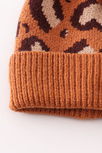 Load image into Gallery viewer, Brown pompom leopard cable beanie
