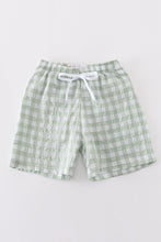 Load image into Gallery viewer, Green seersucker gingham boy swim trunks
